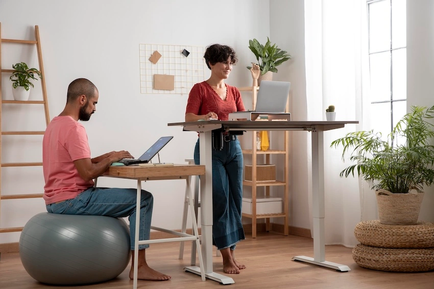 A software developer working in ergonomic workspace setup